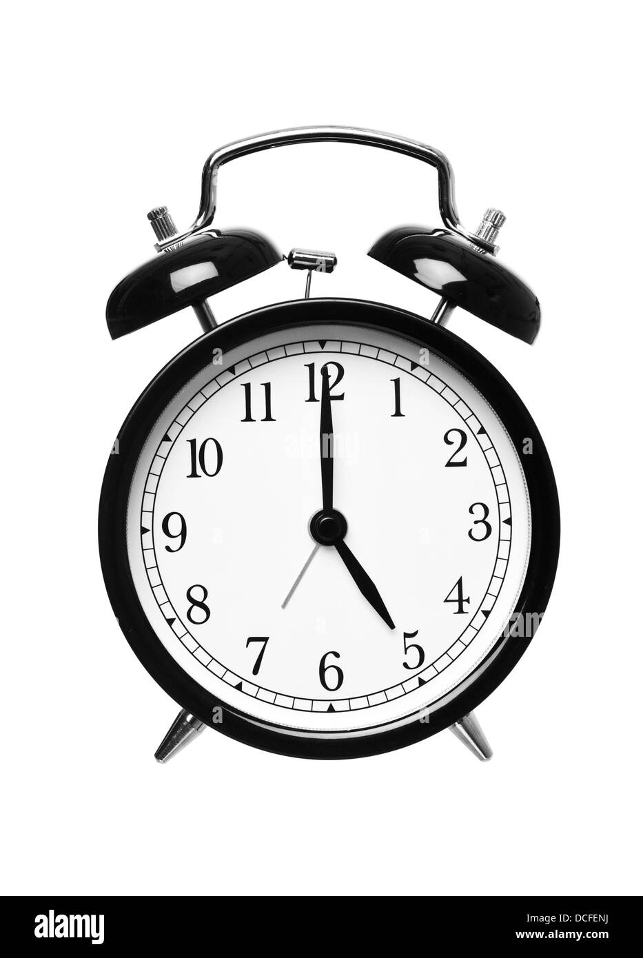 Alarm clock shows five o`clock Stock Photo